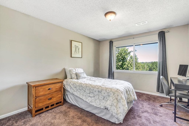 1843 Gascony Parc Dr Unit 1843, Lake St Louis, MO 63367 - bedroom featuring dark colored carpet, a textured ceiling, and baseboards