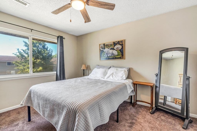 1843 Gascony Parc Dr Unit 1843, Lake St Louis, MO 63367 - bedroom featuring carpet, baseboards, a textured ceiling, and ceiling fan