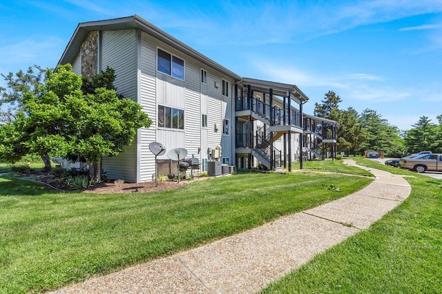 1843 Gascony Parc Dr Unit 1843, Lake St Louis, MO 63367 - view of building exterior featuring cooling unit