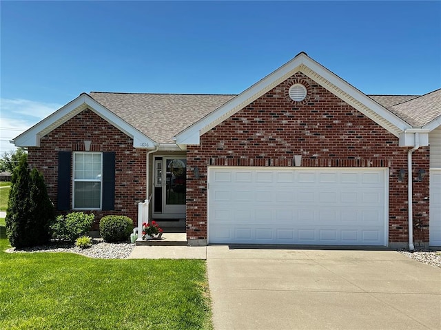 single story home featuring driveway, an attached garage, roof with shingles, and brick siding