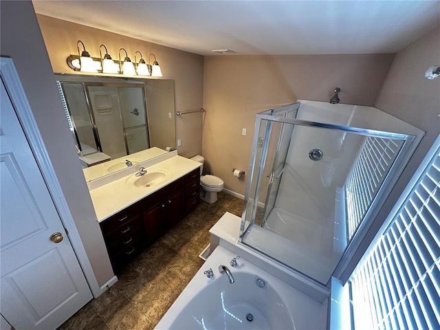 bathroom featuring a stall shower, toilet, vanity, a bath, and baseboards