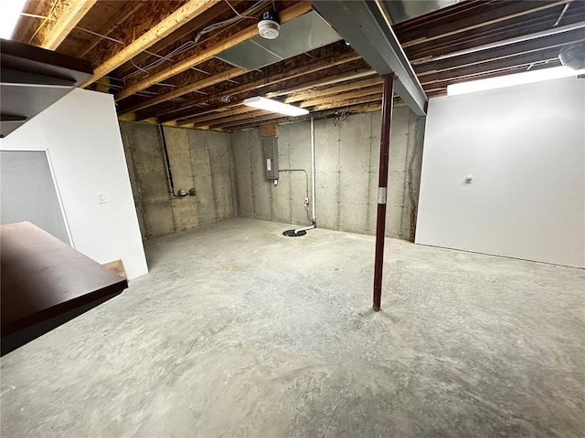 unfinished basement with electric panel