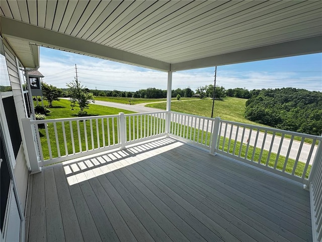 deck featuring a lawn