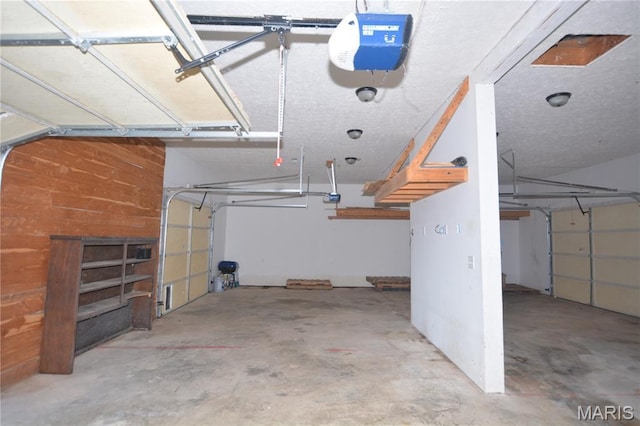 11370 County Road 5220, Rolla, MO 65401 - garage featuring a garage door opener