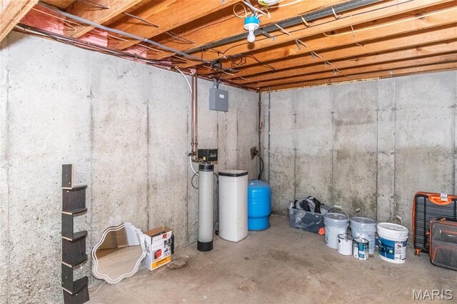 7011 Browns Ford Rd, Dittmer, MO 63023 - unfinished basement featuring a water softener system and a water pressure tank