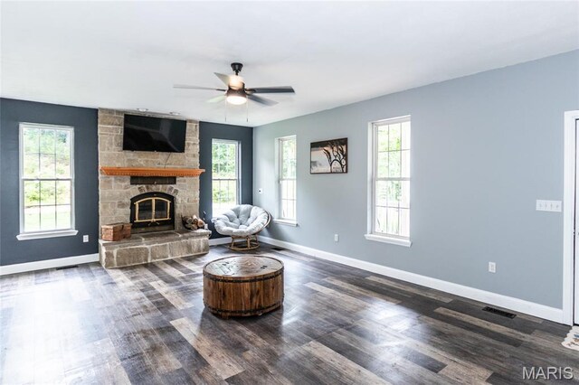 7011 Browns Ford Rd, Dittmer, MO 63023 - living area with ceiling fan, dark wood finished floors, and a fireplace