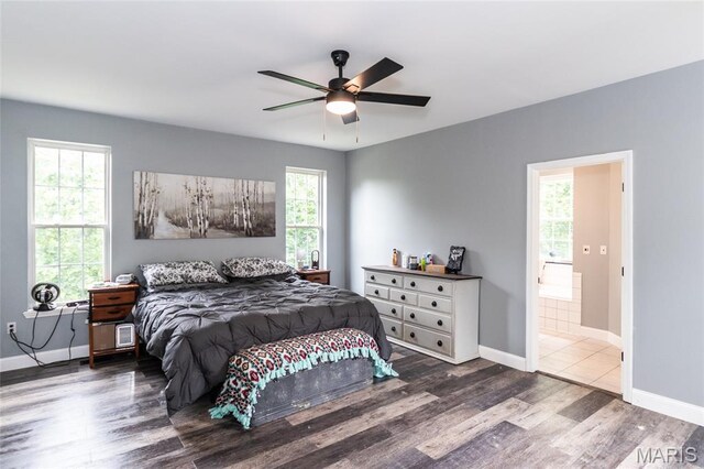 7011 Browns Ford Rd, Dittmer, MO 63023 - bedroom with dark wood-type flooring, ensuite bath, and a ceiling fan