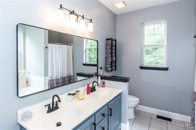 7011 Browns Ford Rd, Dittmer, MO 63023 - full bathroom featuring healthy amount of natural light, double vanity, and tile patterned flooring
