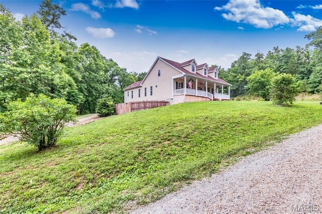 7011 Browns Ford Rd, Dittmer, MO 63023 - view of property exterior with a yard and a porch