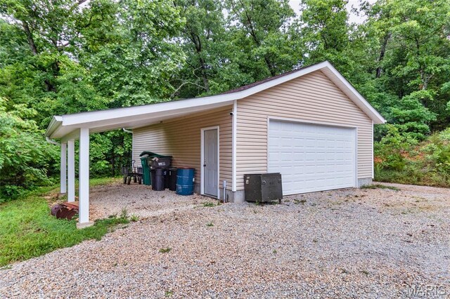 7011 Browns Ford Rd, Dittmer, MO 63023 - garage featuring a garage