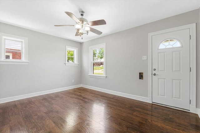 8908 Apache Ln, Overland, MO 63114 - entryway featuring wood finished floors, ceiling fan, and baseboards
