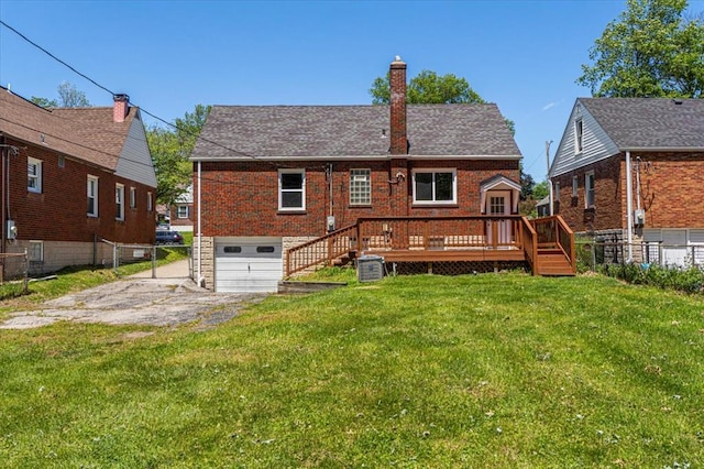 8908 Apache Ln, Overland, MO 63114 - rear view of house with driveway, an attached garage, a wooden deck, a chimney, and brick siding