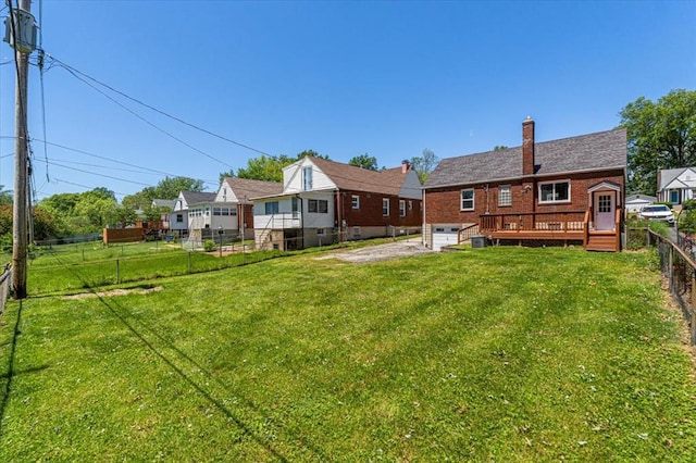 8908 Apache Ln, Overland, MO 63114 - back of property featuring a chimney and a wooden deck