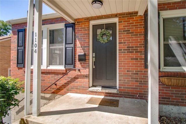 1104 Douglas St, Alton, IL 62002 - property entrance featuring brick siding and a porch