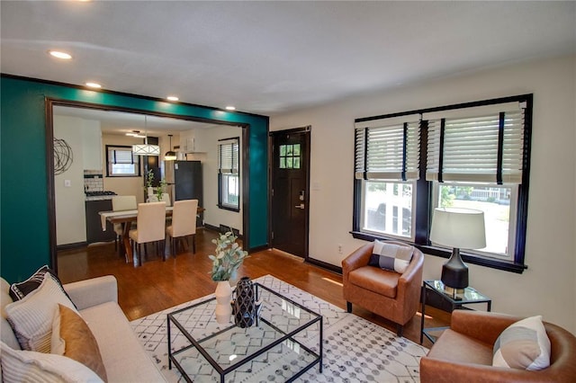 1104 Douglas St, Alton, IL 62002 - living room featuring wood finished floors, baseboards, and recessed lighting