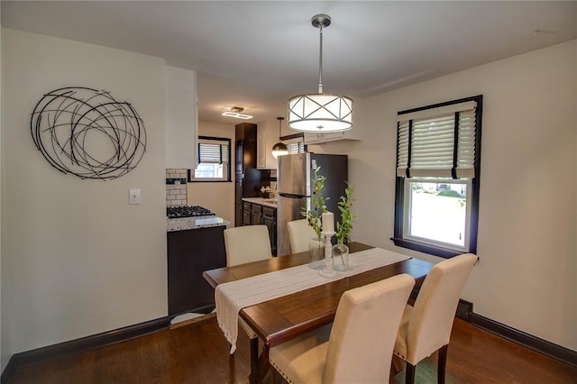 1104 Douglas St, Alton, IL 62002 - dining room featuring dark wood finished floors and baseboards
