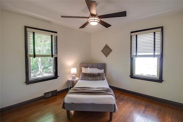 1104 Douglas St, Alton, IL 62002 - bedroom featuring wood finished floors, baseboards, and a ceiling fan