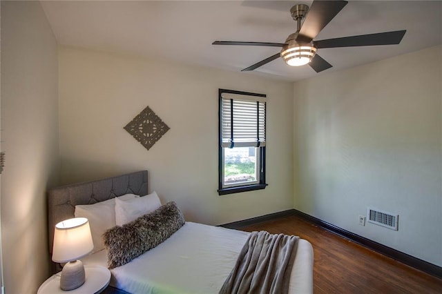 1104 Douglas St, Alton, IL 62002 - bedroom with wood finished floors, baseboards, and ceiling fan