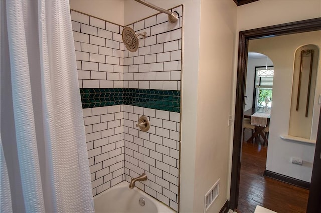 1104 Douglas St, Alton, IL 62002 - full bathroom with wood finished floors, shower / bath combination with curtain, and baseboards