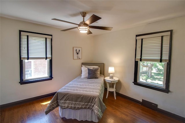 1104 Douglas St, Alton, IL 62002 - bedroom featuring multiple windows, baseboards, and wood finished floors