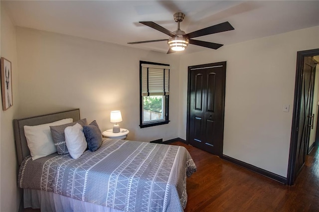 1104 Douglas St, Alton, IL 62002 - bedroom featuring wood finished floors, baseboards, a closet, and ceiling fan