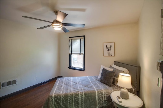 1104 Douglas St, Alton, IL 62002 - bedroom with wood finished floors, ceiling fan, and baseboards