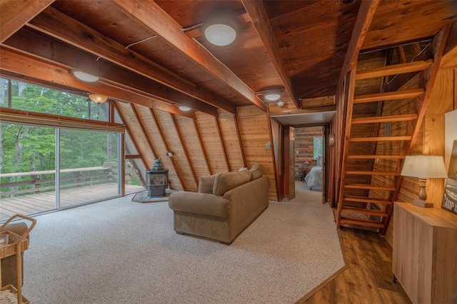 84 E Altdorf Dr, Innsbrook, MO 63390 - living area with a wood stove, wood walls, and wood finished floors