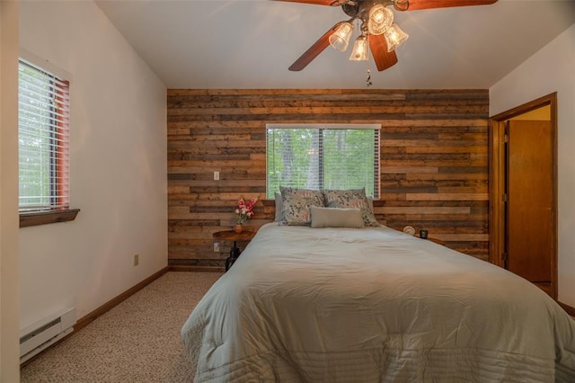 84 E Altdorf Dr, Innsbrook, MO 63390 - bedroom featuring a baseboard heating unit, wooden walls, carpet floors, baseboards, and multiple windows