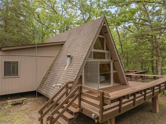 84 E Altdorf Dr, Innsbrook, MO 63390 - back of house with a shingled roof and a wooden deck