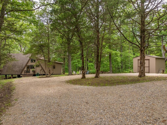 84 E Altdorf Dr, Innsbrook, MO 63390 - view of yard featuring gravel driveway