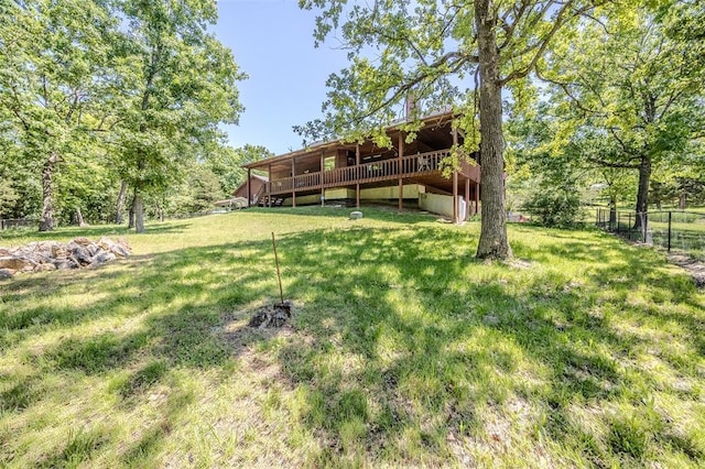 view of yard with a deck