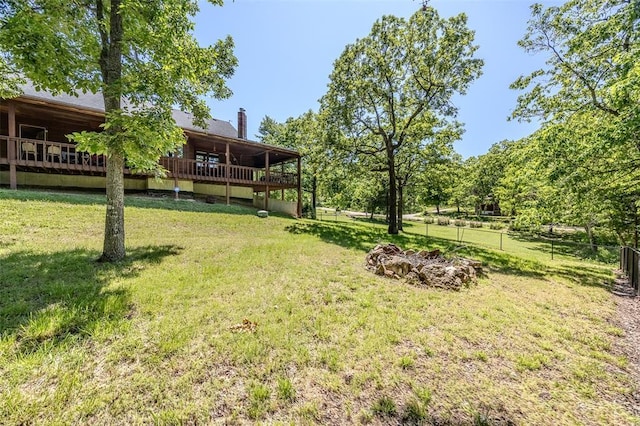view of yard featuring a wooden deck