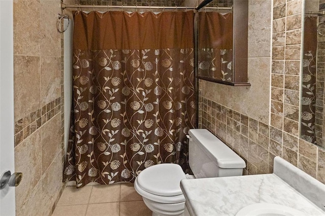 1404 Hampton Ct, Belleville, IL 62223 - bathroom featuring tile walls, toilet, a shower with shower curtain, tile patterned flooring, and vanity