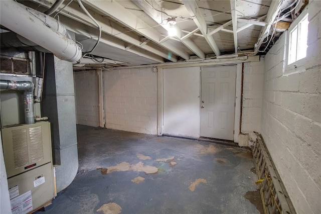 210 W Elm St, Alton, IL 62002 - below grade area featuring heating unit and concrete block wall