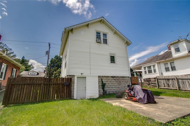 210 W Elm St, Alton, IL 62002 - back of property featuring a patio area