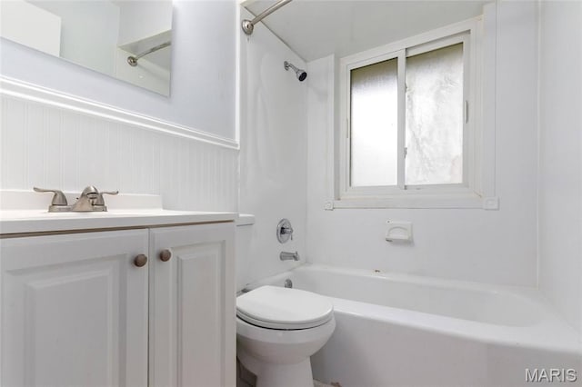 1321 Highmont Dr, Saint Louis, MO 63135 - bathroom featuring bathing tub / shower combination, vanity, and wainscoting