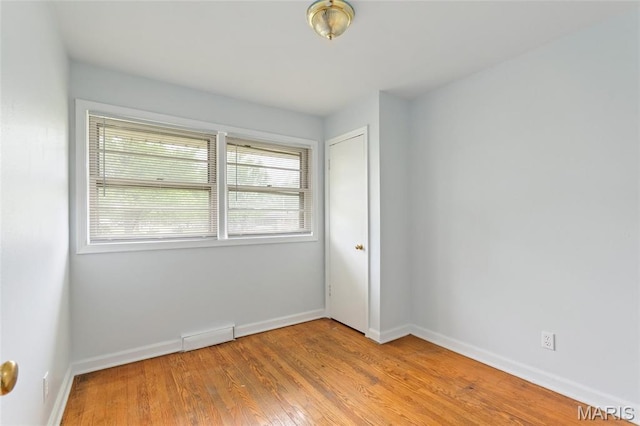 1321 Highmont Dr, Saint Louis, MO 63135 - empty room featuring wood finished floors and baseboards