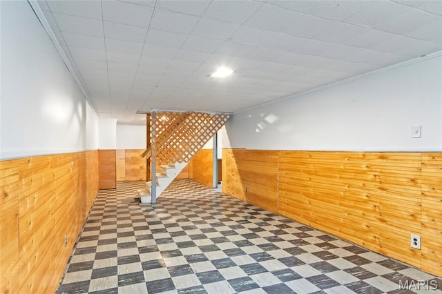 1321 Highmont Dr, Saint Louis, MO 63135 - finished below grade area with tile patterned floors, wooden walls, stairway, wainscoting, and crown molding