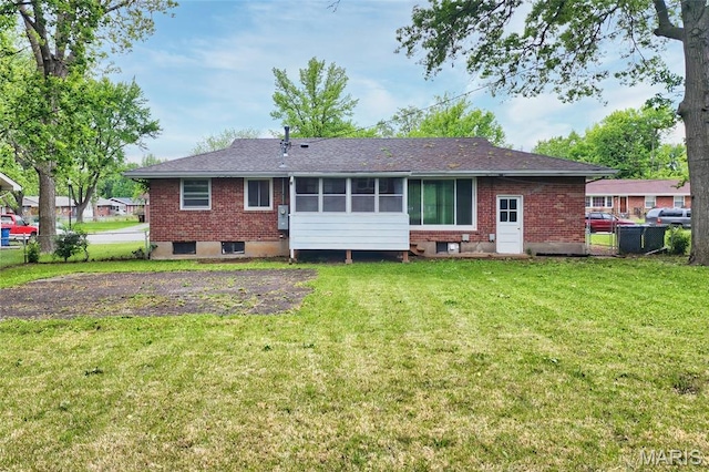 1321 Highmont Dr, Saint Louis, MO 63135 - rear view of property featuring brick siding, a sunroom, and roof with shingles