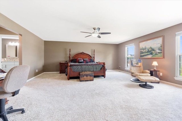 5 The Crossings Ct, Ofallon, MO 63366 - carpeted bedroom featuring baseboards, ensuite bath, and ceiling fan