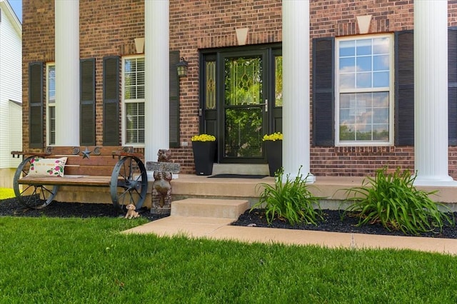 5 The Crossings Ct, Ofallon, MO 63366 - entrance to property with brick siding and a porch
