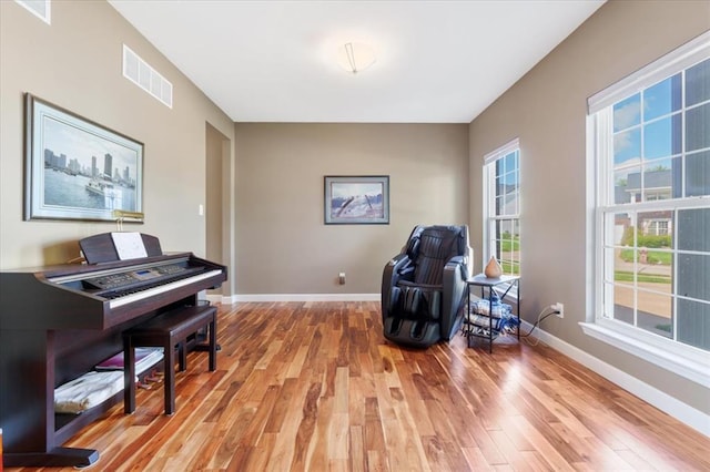 5 The Crossings Ct, Ofallon, MO 63366 - sitting room featuring light wood-type flooring and baseboards