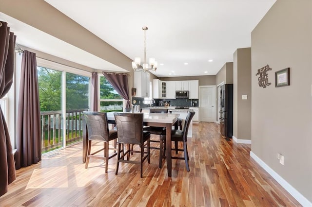 5 The Crossings Ct, Ofallon, MO 63366 - dining space featuring a chandelier, light wood finished floors, baseboards, and recessed lighting