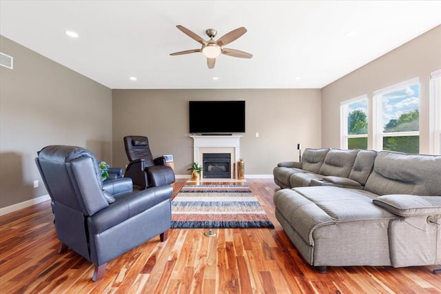 5 The Crossings Ct, Ofallon, MO 63366 - living room featuring a ceiling fan, wood finished floors, baseboards, and recessed lighting