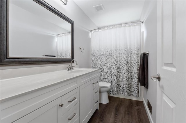 5 The Crossings Ct, Ofallon, MO 63366 - bathroom with vanity, toilet, wood finished floors, and curtained shower