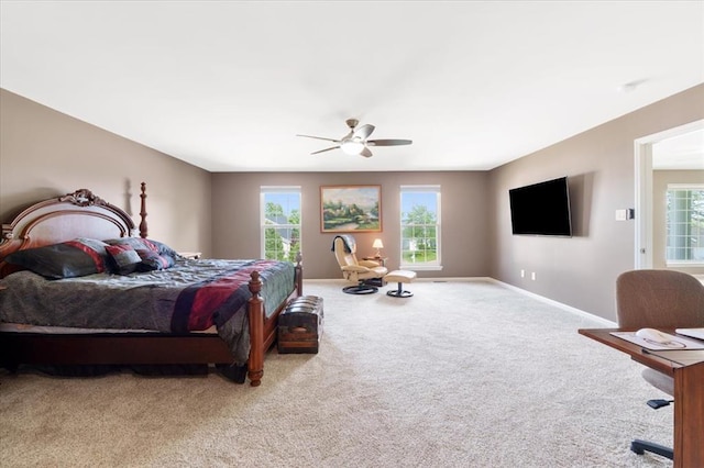 5 The Crossings Ct, Ofallon, MO 63366 - carpeted bedroom featuring baseboards, multiple windows, and ceiling fan