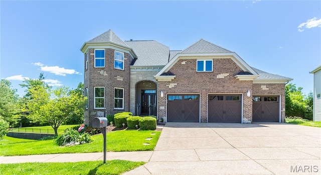 106 Tuscany Trace Dr, Saint Charles, MO 63303 - view of front of house with brick siding, concrete driveway, a garage, and a shingled roof