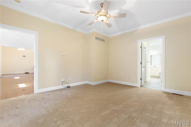 106 Tuscany Trace Dr, Saint Charles, MO 63303 - spare room with carpet, crown molding, ceiling fan, and baseboards