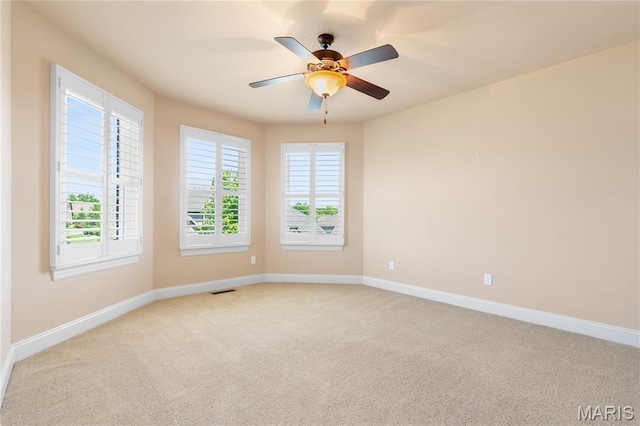 106 Tuscany Trace Dr, Saint Charles, MO 63303 - empty room with light carpet, baseboards, and a ceiling fan