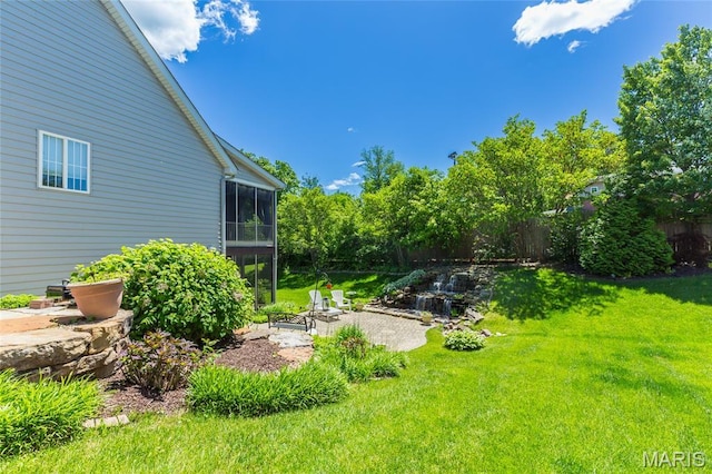 106 Tuscany Trace Dr, Saint Charles, MO 63303 - view of yard with a patio area and a sunroom